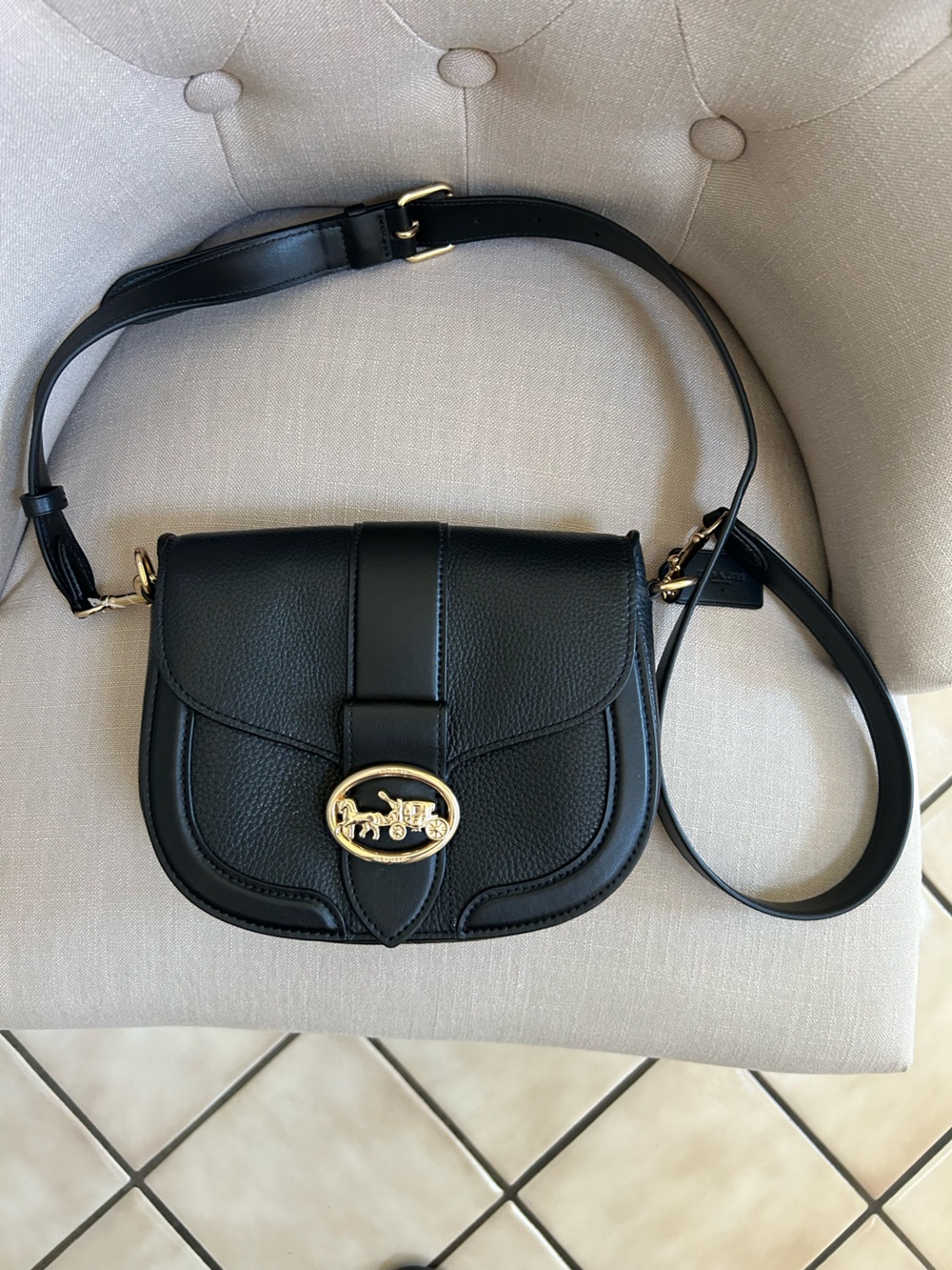 Coach Black Pebbled Leather Saddle Crossbody with Gold Accent